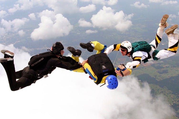 Parachuting,Air sports,Extreme sport,Fun,Parachute,Windsports,Flip (acrobatic),Sports,Jumping,Team