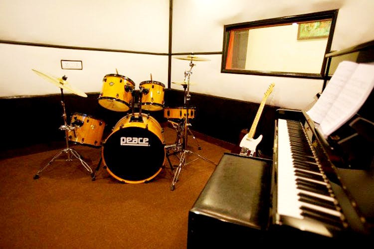 Musical instrument,Studio,Recording studio,Percussion,Piano,Musical keyboard,Musician,Musical instrument accessory,Electronic instrument,Music