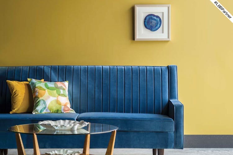 Blue,Living room,Furniture,Couch,Room,Cobalt blue,Turquoise,Green,Yellow,Interior design